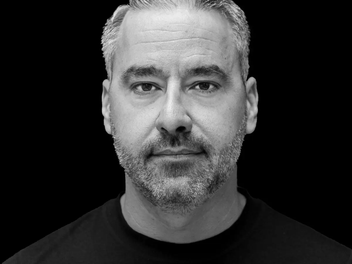 Black and white portrait of Brett Tanner