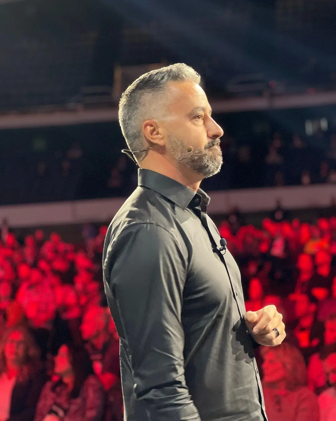 Brett Tanner on stage in front of a crowd