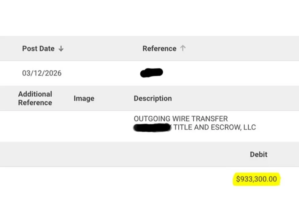 Bank record showing an outgoing wire of 933,300 dollars to a title and escrow company