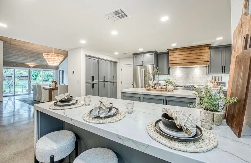 Kitchen after, marble island and new cabinetry