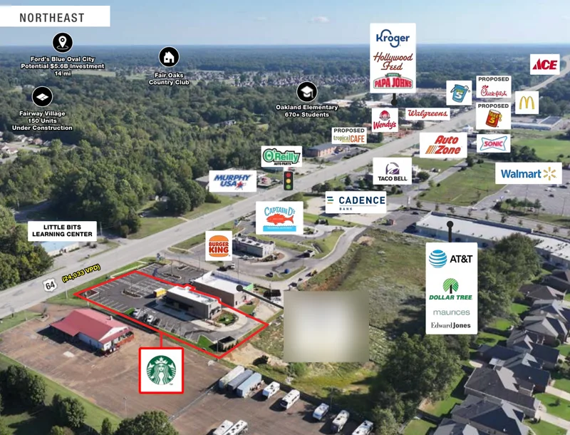 Aerial view of the Starbucks site outlined in red, surrounded by a school, national retailers, new housing construction, and a highway